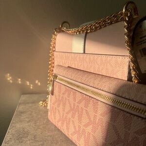 Michael kors crossbody bag and wallet, with tags never used.